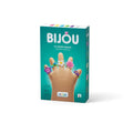 Teal box for Bijou Flower Rings featuring a hand wearing five colorful, sculpted clay rings in floral designs.
