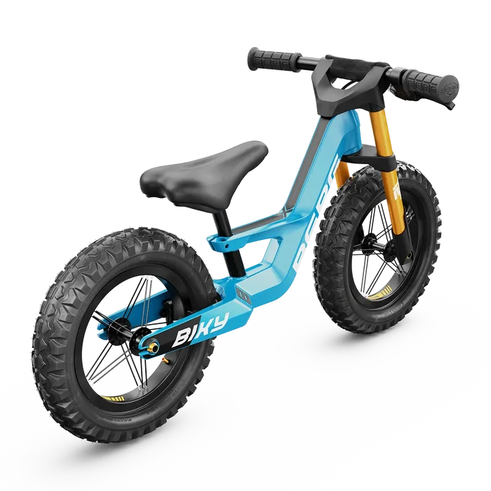Blue balance bike with gold forks, chunky off-road tires, a handbrake lever, and Biky logo on the frame.