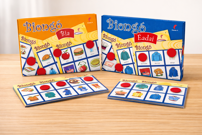 Orange and blue Biongó bingo boxes with illustrated food and clothing cards and red circular markers.