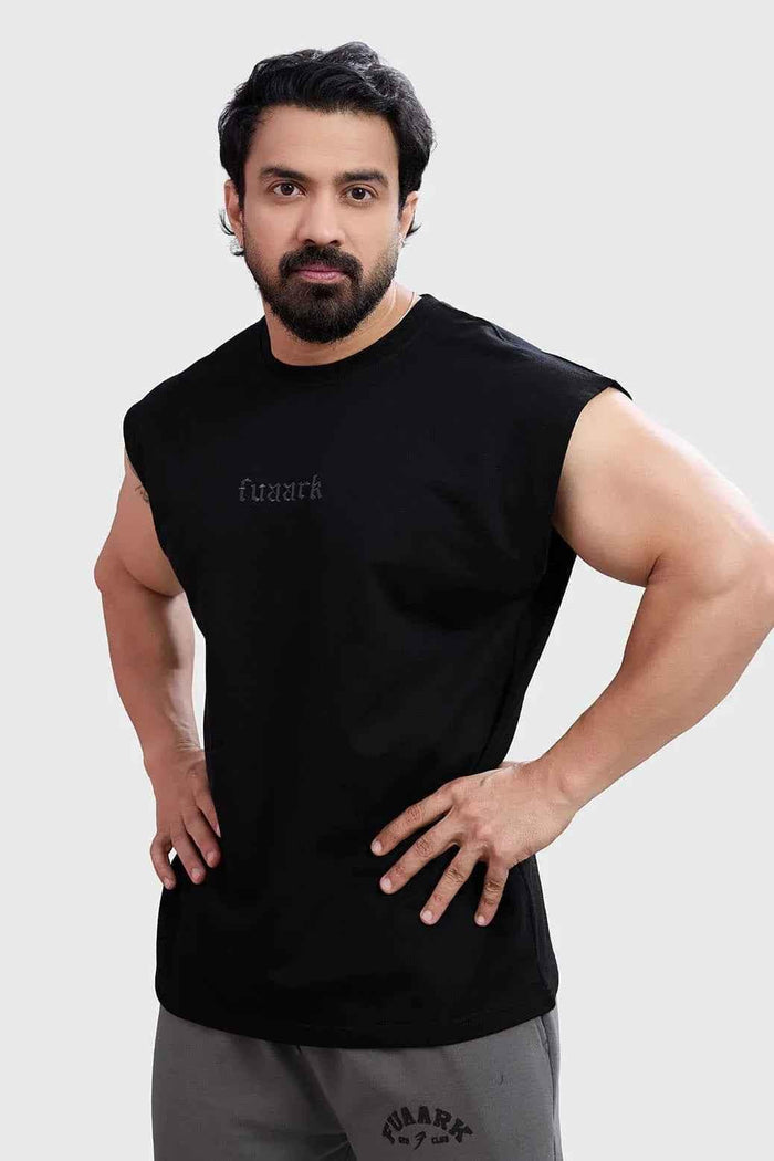 Black Fuaark Nz blackout cap-sleeves tank top shown on model, close-up view highlighting black fabric and sleeveless design.