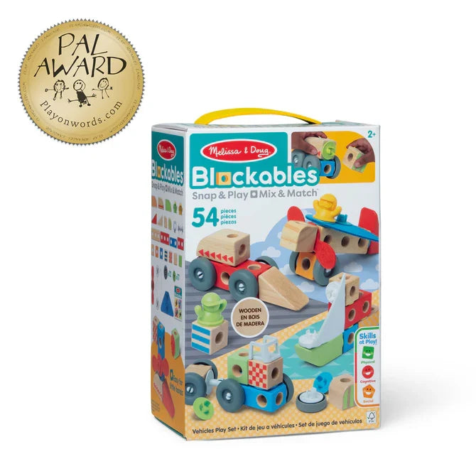Colorful wooden blocks and plastic connectors assembled into toy vehicles on a blue box with a gold award seal.