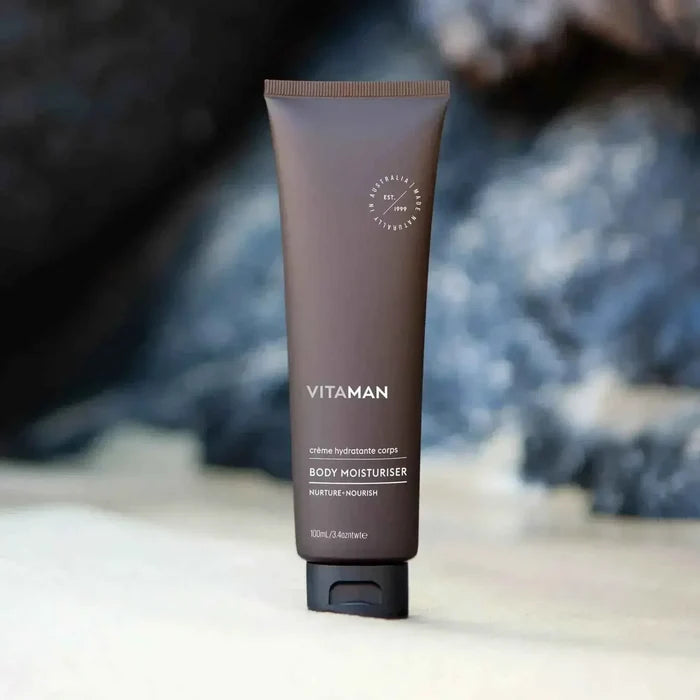 VITAMAN Australia body moisturizer in a sleek bottle, designed to nourish and hydrate skin with natural ingredients.