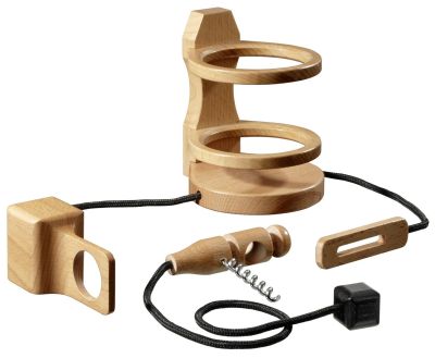Light wood bottle puzzle featuring a stand with rings, a metal corkscrew, and blocks connected by black cord.
