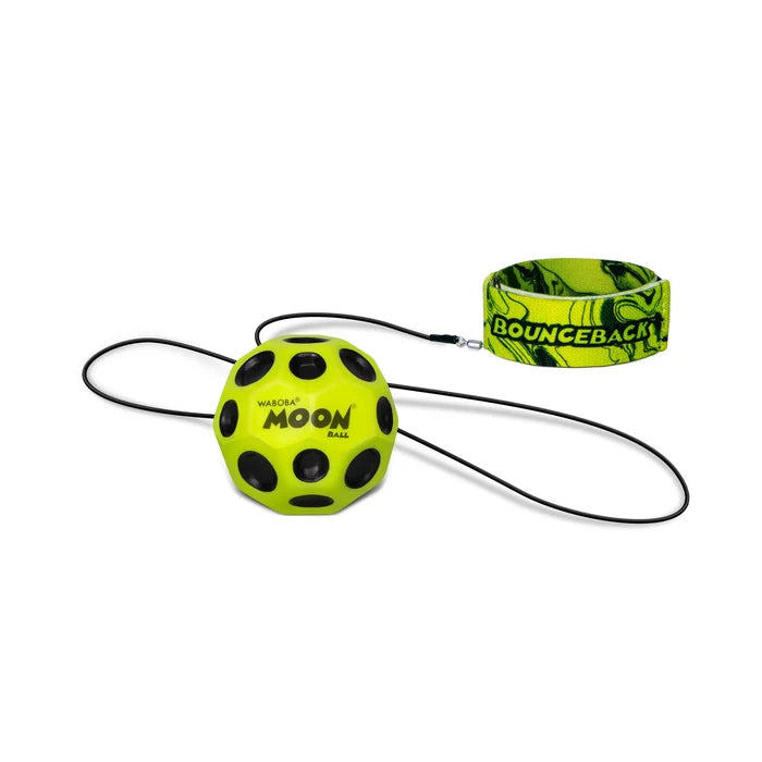 Neon green Moon Ball with black craters attached by a black elastic cord to a matching patterned wristband.