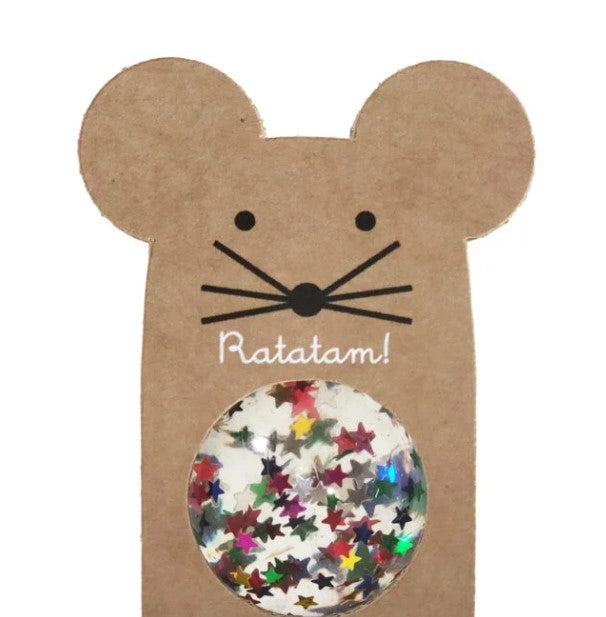 A clear ball filled with colorful glitter stars, packaged inside a mouse-shaped brown cardboard cutout with whiskers.