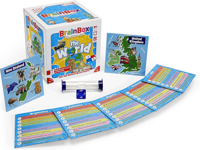 Geography board game box with colorful illustrated country cards, a blue eight-sided die, and a plastic sand timer.