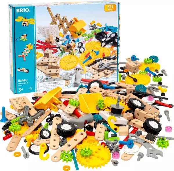A BRIO Builder Creative Set box behind a pile of colorful wooden planks, plastic gears, wheels, and grey toy tools.