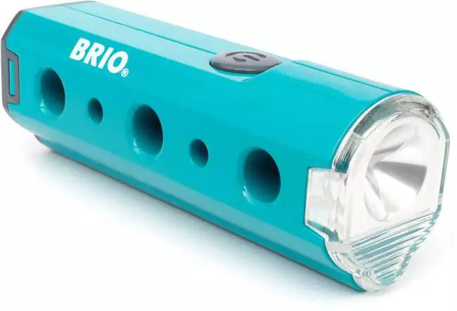 Teal rectangular flashlight with circular side holes, a grey power button, clear lens, and white BRIO logo.