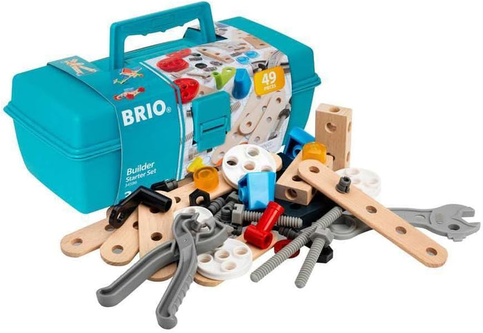 Teal BRIO toolbox behind wooden planks, colorful plastic pieces, grey screws, and toy pliers scattered in front.