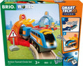 BRIO train set box showing a blue and orange locomotive with glowing lights exiting an orange arch onto wooden tracks.