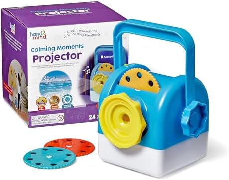 Blue and white toy projector with yellow knobs and handle next to purple box and red and teal projection discs.