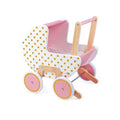 White wooden doll pram with yellow polka dots, pink interior, natural wood handle, and pink wheels with white rims.
