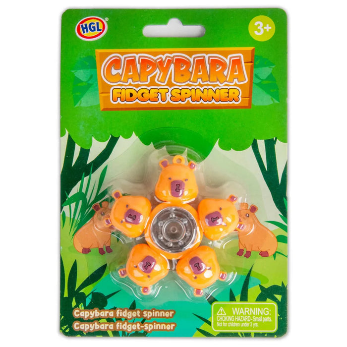 Orange fidget spinner with five capybara heads on green jungle-themed packaging with a central silver bearing.