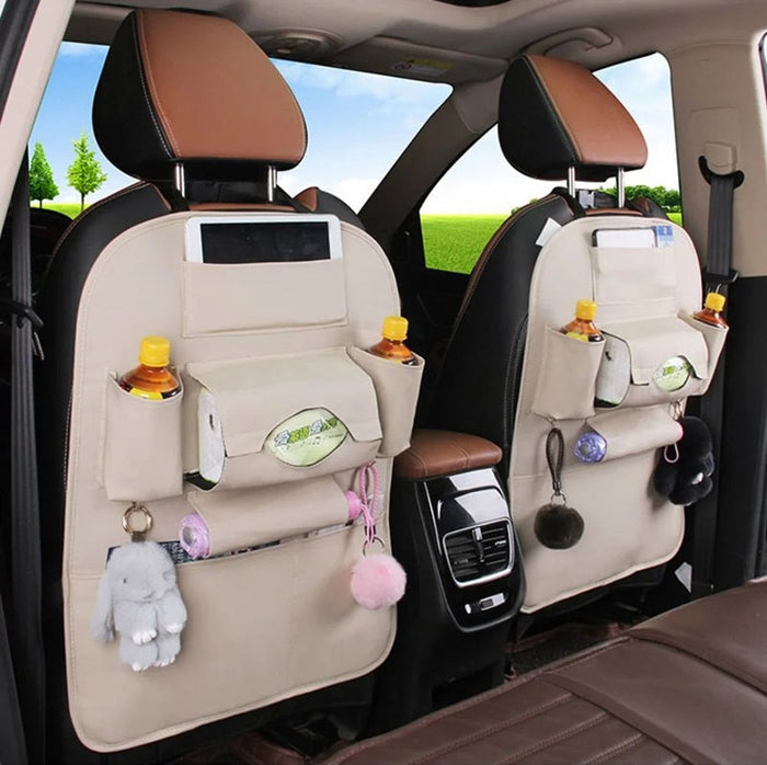 White car back seat storage bag with multiple pockets, ideal for organizing essentials on the backseat of a vehicle.