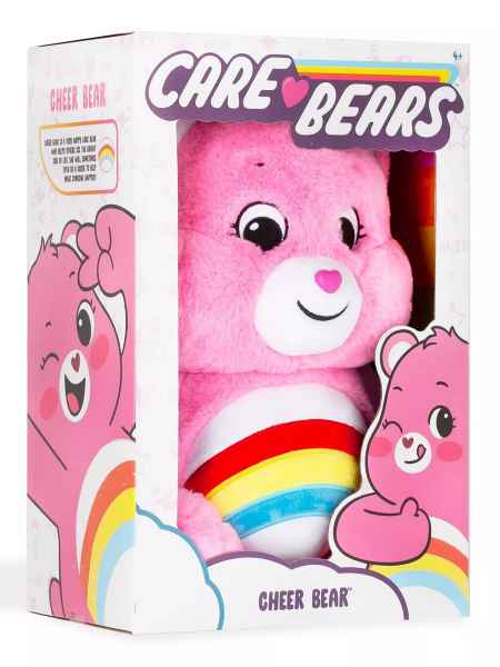 Pink plush Cheer Bear with a rainbow belly, displayed in a white and pink illustrated box.