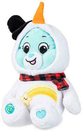 Light blue plush bear in a white snowman outfit with a carrot nose, black top hat, and red plaid scarf.