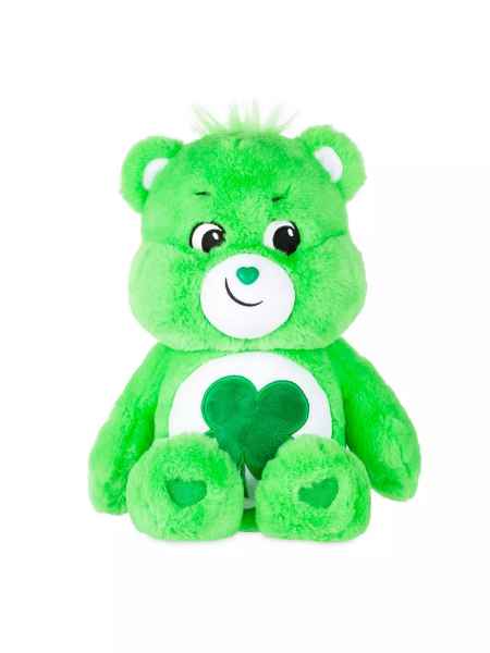 Bright green plush bear with a four-leaf clover on its belly, heart-shaped nose, and paw pads, sitting upright.