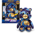 Navy blue star-patterned plush bear with gold moon belly, shown in and next to its collector edition display box.