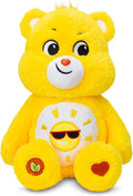 Yellow plush bear with a smiling sun wearing sunglasses on its white belly and heart and leaf icons on its feet.