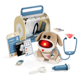 Tan plush dog with glowing red nose, blue stethoscope, medical tools, and wooden carrying case.