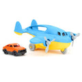 Blue and yellow toy cargo plane with grey propellers and wheels next to a small orange toy car.