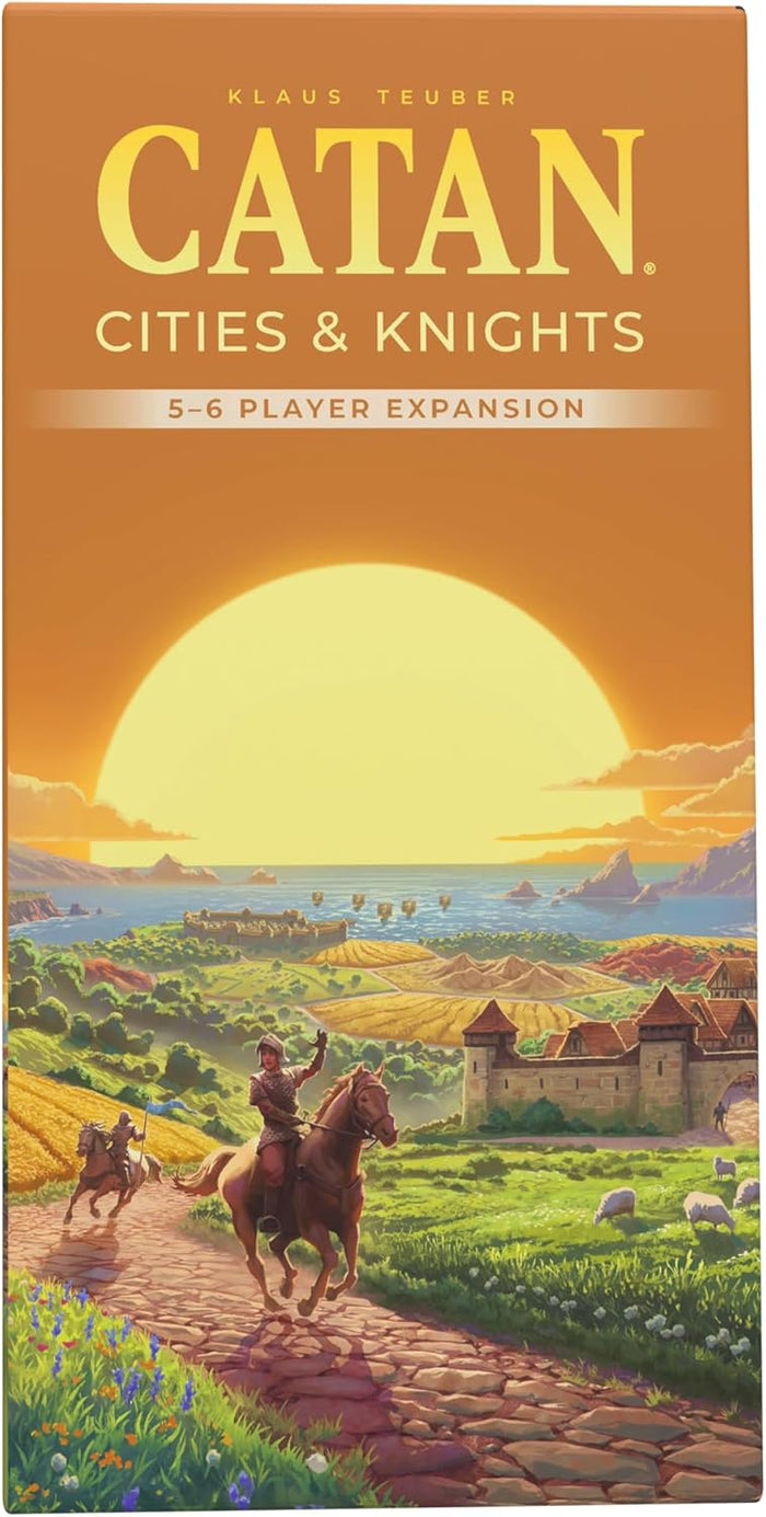 Orange box featuring knights on horseback riding through a sunset landscape with a fortified city and green fields.