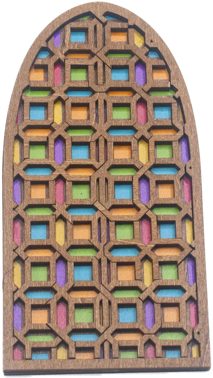 Arched wooden puzzle with intricate geometric cutouts and colorful panels in blue, green, yellow, orange, and purple.