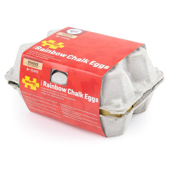 Six egg-shaped chalks in a grey cardboard carton with a red BigJigs label. A white egg shows through a small cutout.