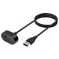 Black Fitbit Inspire, Ace 2, and Inspire HR charger with USB-C cable compatible with That Watch Shop chargers.