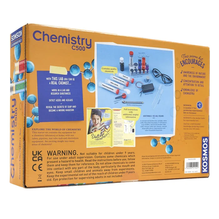 Orange box for a chemistry set featuring blue text and images of test tubes, safety goggles, and lab equipment.