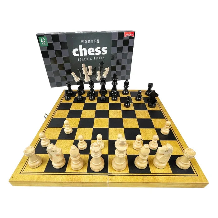 Wooden chess set with black and light wood pieces on a folding board, with the product box in the background.