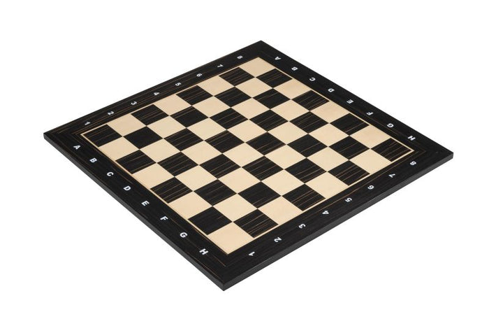 Square wooden chessboard with dark and light wood squares and white coordinate letters and numbers on a black border.