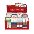 Red display box filled with small, gift-wrapped game boxes in festive patterns like stripes and polka dots.