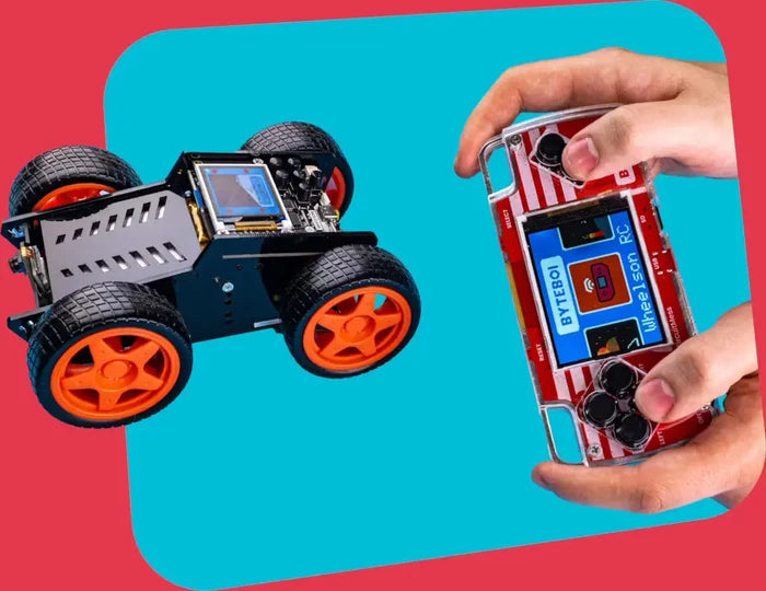Handheld red and white DIY console with screen controls a black four-wheeled robot with bright orange rims.