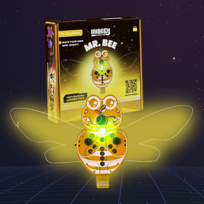 Orange bee-shaped circuit board robot with glowing yellow wings, standing in front of its yellow product box.