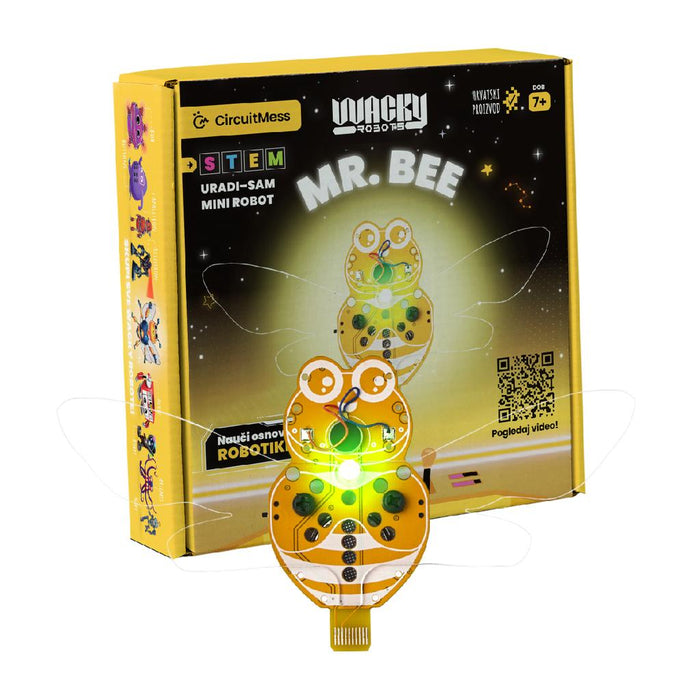 Bee-shaped circuit board robot with glowing light and wings, shown with its yellow and black STEM kit box.