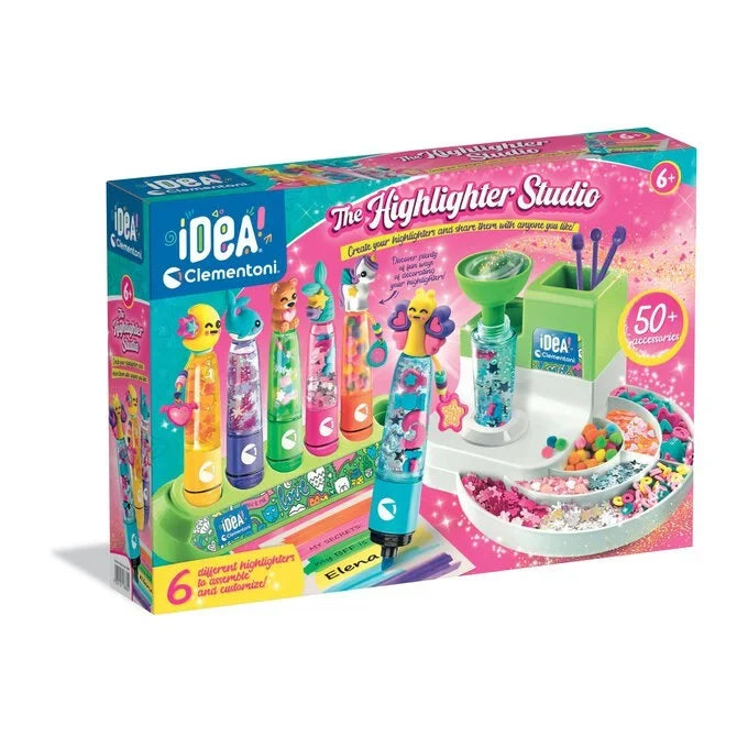 Pink box for a highlighter kit showing a green assembly station, animal-topped pens, and colorful craft accessories.