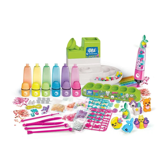 Colorful DIY highlighter kit with ink bottles, green workstation, animal charms, and glitter accessories.