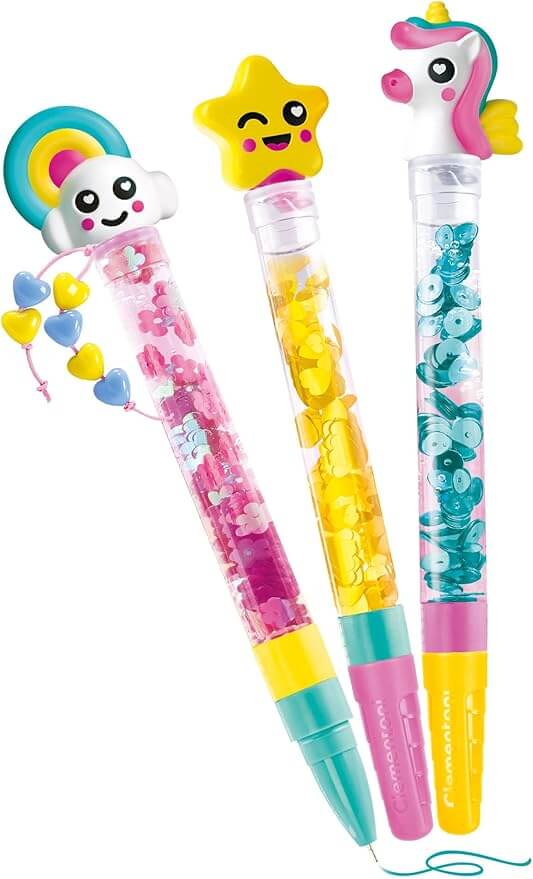 Three vibrant pens with liquid-filled barrels and sequins, topped with a rainbow, winking star, and pink unicorn.