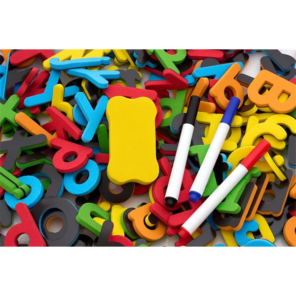 Colorful foam magnetic letters, three dry-erase markers with colored caps, and a yellow foam eraser.