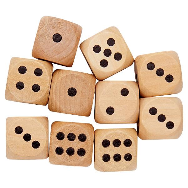 Ten light-colored natural wood dice with rounded corners and black dots, showing numbers one through six.