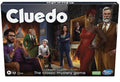 Cluedo game box showing six diverse suspects in a library. Features large white logo and characters in formal attire.