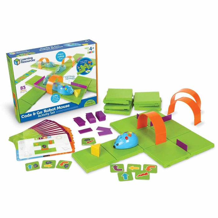 Blue robot mouse toy with green tiles, orange arches, purple walls, yellow cheese, and coding cards next to the box.