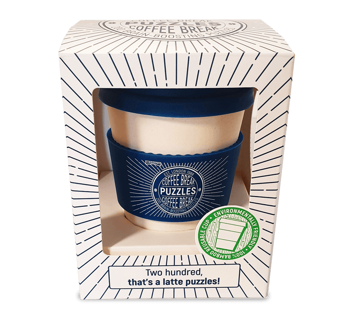 Cream and navy blue reusable bamboo coffee cup in a white box with black sunburst lines and green eco-friendly sticker.