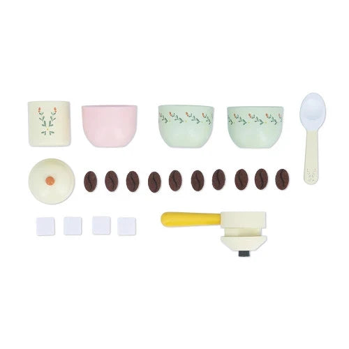 Pastel wooden coffee toy pieces, including floral bowls, dark brown coffee beans, sugar cubes, and a portafilter.