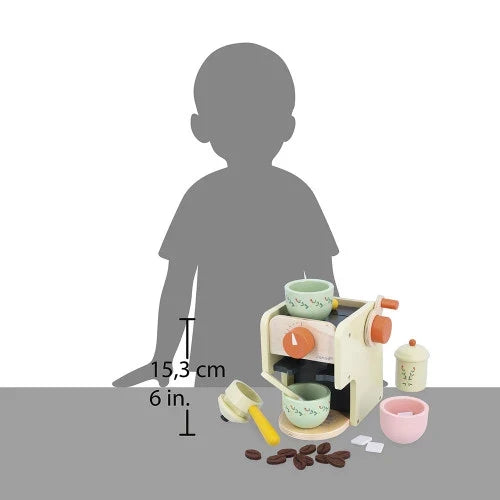 Pastel wooden toy coffee machine set with cups and accessories, shown beside a child's silhouette for scale.
