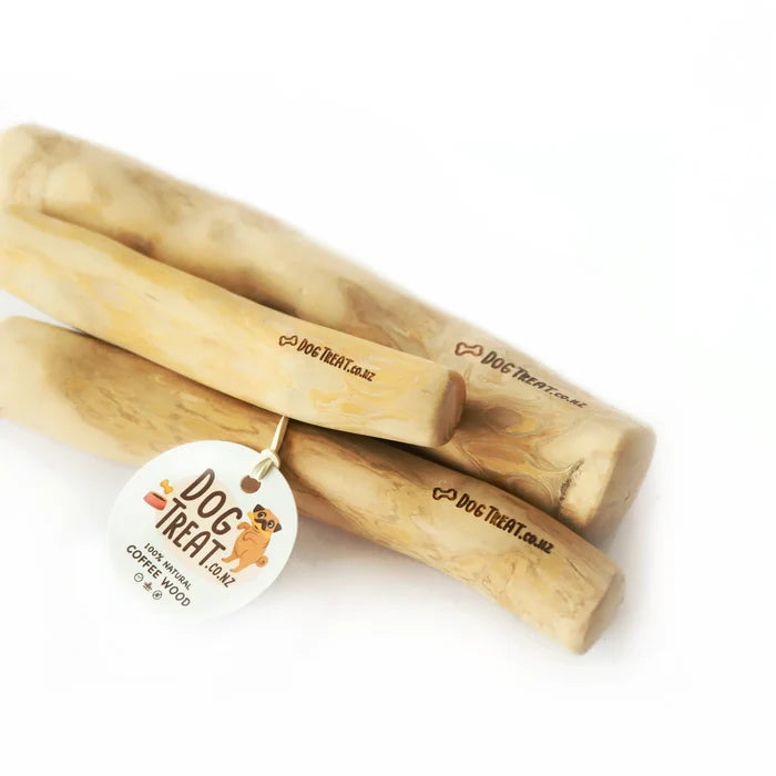 Dog treat made from coffee wood by DogTreatNZ, showing a natural coffee wood chew for dogs on a white background.