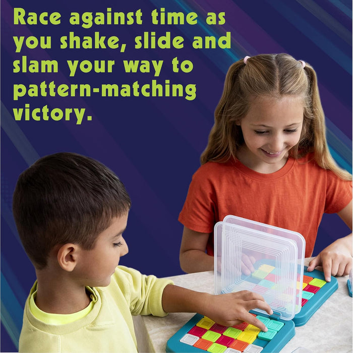 Two kids sliding red, yellow, green, and white tiles on teal game boards separated by a clear divider.
