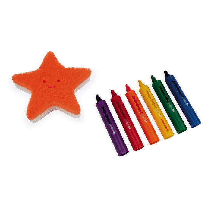 Orange star sponge with a smiley face and six bath crayons in purple, red, orange, yellow, green, and blue.