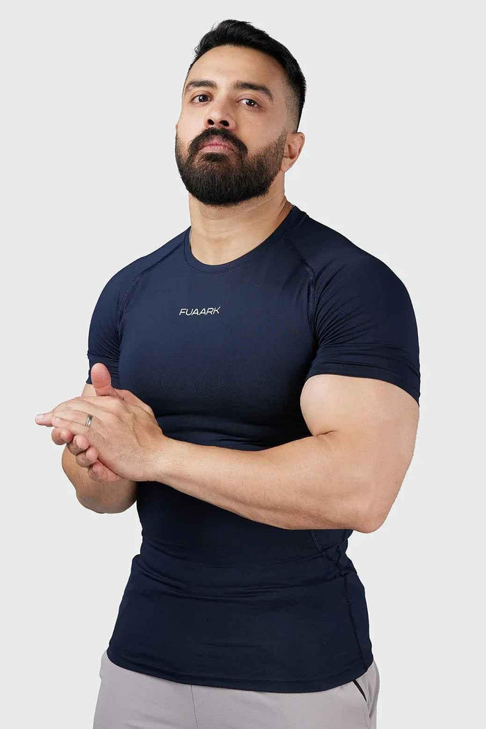 Navy Compression 2.0 T-shirt by Fuaark Nz, close-up showing fitted athletic T-shirt with logo detail.